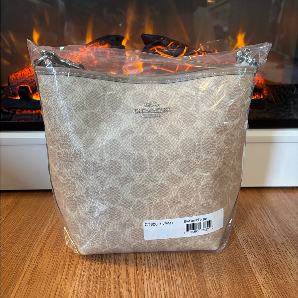Brand new with tags. Coach purse cross body with handle
